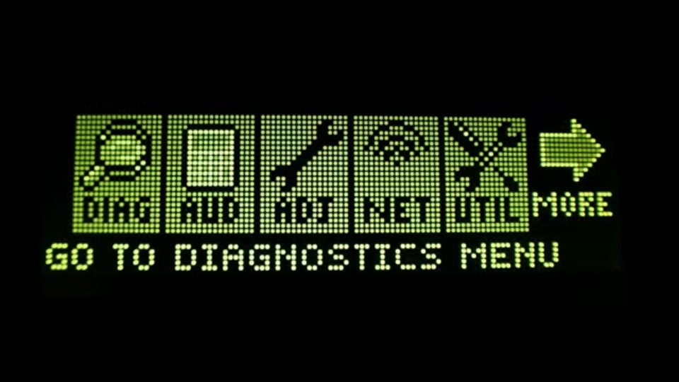 Menú antiguo de Stern Pinball con CPU Spike 2: iconos DIAG, AUD, ADJ, NET, UTL y MORE en estilo DMD verde